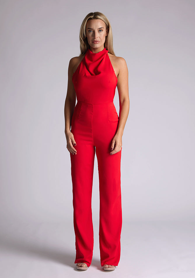 Front image of blonde model red collar detail jumpsuit with a strapless design and halter neck, this jumpsuit offers both comfort and sophistication. The designed featured is the Vesper Cindy Red Collar Detail Jumpsuit