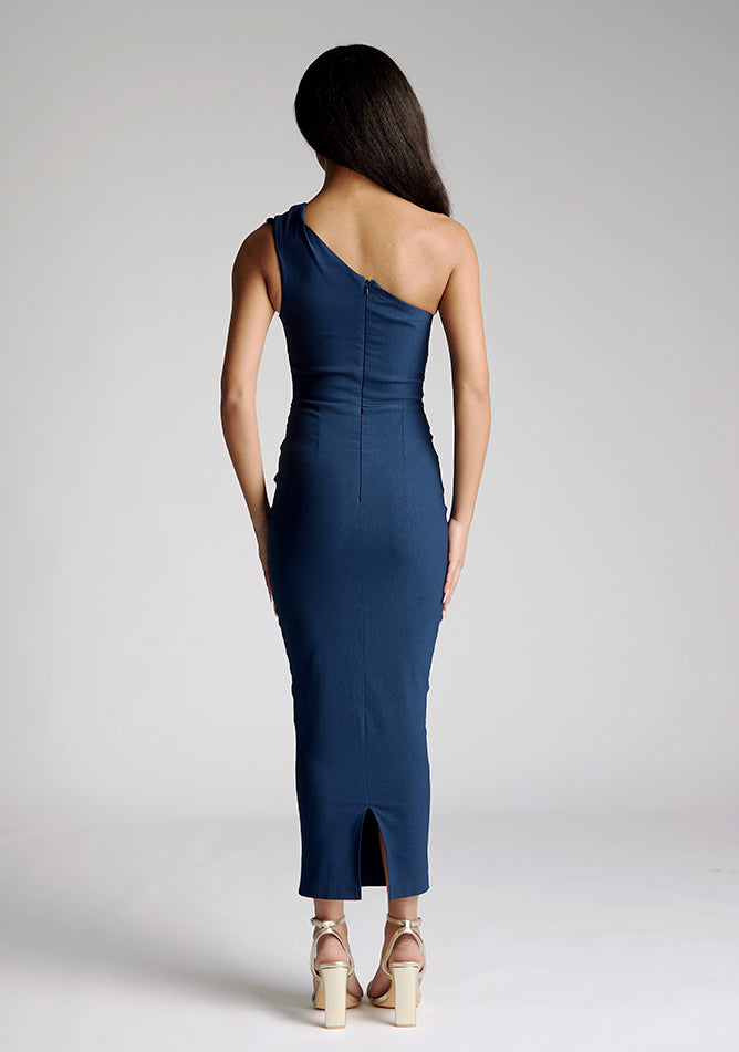 Back image of a model wearing a Navy Midaxi Dress with a one shoulder wide strap, asymmetric neckline and bodycon fit with back zip. The design features Vesper Nevada Navy One Shoulder Midaxi Dress