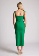 Back image of the model wearing a emerald body con midaxi dress with a square neckline and a front split. The design featured is the Vesper Abbie Emerald Midaxi Dress