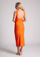 Quarter Back image of a model wearing a Orange Cross Neck Midaxi Dress with a crossover neck detail with flattering open back, and a high leg split, a design features Vesper Aida Orange Cross Neck Midaxi Dress