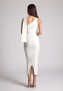 Back image of a model wearing an ivory sleeveless dress, featuring a body con dress with asymmetric straps