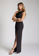 Quarter side image of blonde model wearing a One Shoulder Black Maxi Dress with an asymmetric neckline and a daring thigh-high leg slit and a front cut-out, design features Vesper Fliss One Shoulder Black Maxi Dress