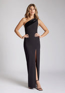 Back image of blonde model wearing a One Shoulder Black Maxi Dress with an asymmetric neckline and a daring thigh-high leg slit and a front cut-out, design features Vesper Fliss One Shoulder Black Maxi Dress