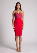 Front image of a model wearing a pink and red dress with a cut out in the bardot neckline. The dress featured is the Hannah pink and red midi dress