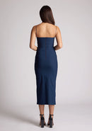 Back image of a model wearing a navy dress with two cut out sections at the bust. The dress featured is the Kendall navy midaxi dress