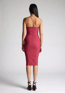 Back image of the model wearing a Raspberry Midi Dress with a asymmetrical neckline with one strap, and a bodycon silhoutte, a design features Vesper Leslie Raspberry Midi Dress