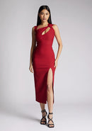 Front image of a model wearing a wine midaxi dress, featuring a cut out at the front and asymmetric straps. The dress featured is the Vesper Queenie wine midaxi dress