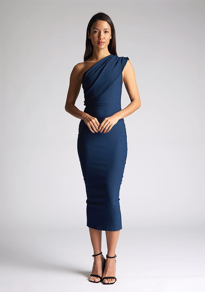 Front  image of the model wearing a Navy Midaxi Dress with a one-shoulder design, a asymmetric cut, and a bodycon fit, a design features Vesper Rena Navy Midaxi Dress