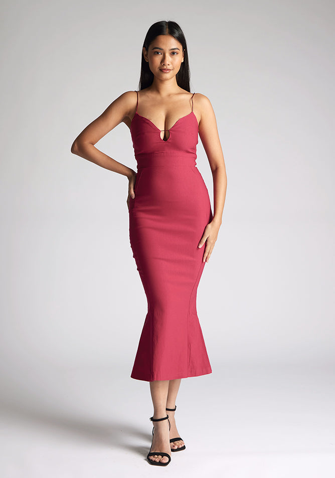 Front image of the model wearing a Raspberry Midaxi Dress with a sweetheart neckline with a thin straps, and a slim fit, a design features Vesper Roisin Raspberry Midaxi Dress