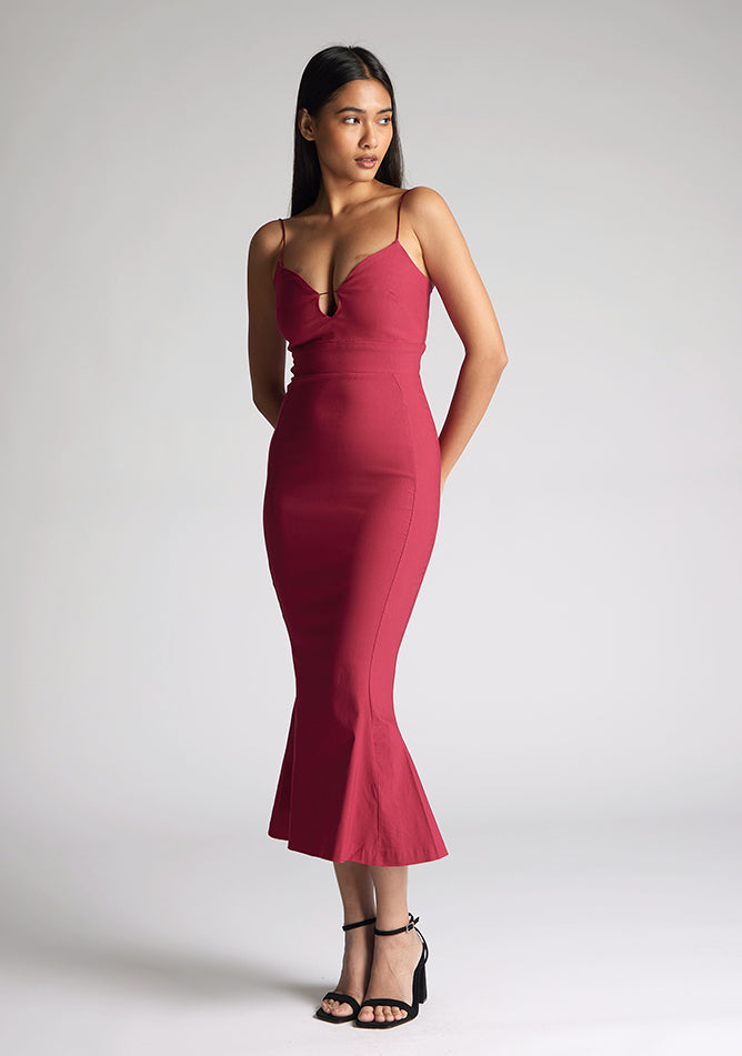 Front quarterimage of the model wearing a Raspberry Midaxi Dress with a sweetheart neckline with a thin straps, and a slim fit, a design features Vesper Roisin Raspberry Midaxi Dress
