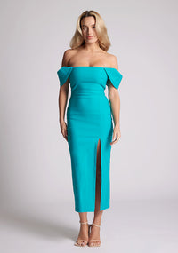 Front image of a model wearing a lake green bardot dres with a  stunning bardot neckline with armbands and a front skirt split. The design featured is the Vesper Astra lake Green Bardot Midaxi Dress