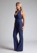Front quarter image of a model wearing navy wide leg trousers with a flattering high waist and wide leg design. The design featured is the Vesper Connie Navy Wide Leg Trousers paired with Vesper Eve Navy Waistcoat