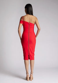 Back image of a model wearing a red midi Dress with an unique one-shoulder design and arm band on one side, and a statement gold centre back zip. The dress featured is Vesper Emma Red One Shoulder Midi Dress.