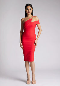 Front image of a model wearing a red midi Dress with an unique one-shoulder design and arm band on one side, and a statement gold centre back zip. The dress featured is Vesper Emma Red One Shoulder Midi Dress.