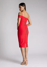 Quarter back image of a model wearing a red midi Dress with an unique one-shoulder design and arm band on one side, and a statement gold centre back zip. The dress featured is Vesper Emma Red One Shoulder Midi Dress.