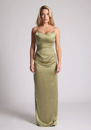 Front image of a model wearing an Olive Green Maxi Dress with a scoop neckline, thin straps, an asymmetric strap detail, subtle pleat detail at side of hip. The&nbsp; dress featured is Vesper Lorah Olive Maxi Dress.