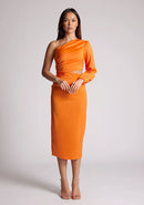 Front image of a model wearing an orange midi  dress, featuring an asymmetric neckline with one sleeve, with a side waist cut-out detail.The dress featured is the Vesper Niccola Orange Midi Dress.
