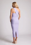 Back quarter image of blonde model wearing lilac one shoulder midaxi dress with a unique one-sleeve design, asymmetric cut neckline, bycon fit, back zip and closure short split. The design featured is the Vesper Teo Lilac One Shoulder Midaxi Dress