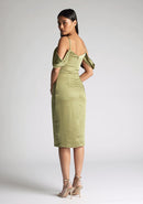 Back quarter image of model wearing a olive satin bardot midi dress with a  delicate allure satin, cowl neckline and invisible back zip with thin straps and draped arm bands.  The design featured is the Vesper Victoria Olive Satin Bardot Midi Dress