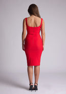 Back image of model wearing a red pencil dress with a square-cut neckline and straps and a bodycon fit. The design features is the Vesper Zada Red Bodycon Pencil Midi Dress