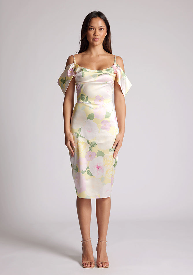 Front image of a model wearing a Floral Print Satin Bardot Midi Dress with a cowl neckline and invisible back zip with thin straps and draped arm bands, a design features Vesper Victoria Floral Print Satin Bardot Midi Dress