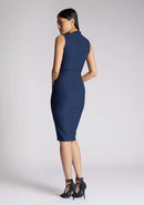 Back quarter image of a model wearing a navy midi dress, featuring a square neck line and high back. The dress featured is the Vesper Wintar navy midi dress