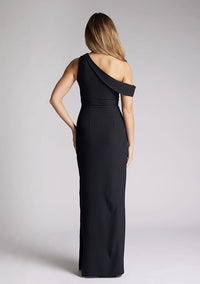 Back  image of a model wearing a black maxi dress, featuring a one shoulder design with a band that encompasses the opposite arm. The dress featured is the Vesper Yvette black maxi dress