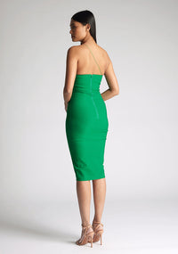 Quarter back image of the model wearing an emerald midi dress with a asymmetrical neckline with one strap, and a bodycon silhouette, the style featured is Vesper Leslie Emerald Midi Dress