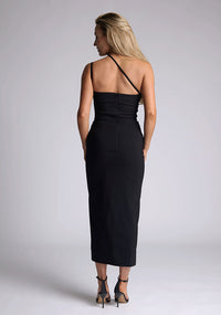Back image of the model wearing a black bodycon midaxi dress with a straight neckline, cross strap detail, and front skirt split. The design featured is the Vesper Abigail Black Cross Strap Midaxi Dress