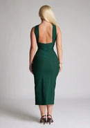 Back image of blonde model wearing a forest green midaxi dress with a  flattering open back and ultra-sexy high leg split and a crossover neckline design. The design featured is the Vesper Aida Forest Green Cross Neck Midaxi Dress
