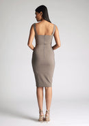 Back image of a model wearing a taupe midi bodycon dress with a soft v-neckline, bodycon fit, wide straps and centre-back zip. The design featured is the Vesper Azzura Tuape Midi Bodycon Dress