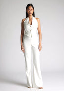 Front image of model wearing a ivory wide leg trousers with a flattering high waist and wide leg design. The design featured is the Vesper Connie Ivory Wide Leg Trousers paired with Vesper Eve Ivory Waistcoat