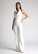 Front quarter image of model wearing a ivory wide leg trousers with a flattering high waist and wide leg design. The design featured is the Vesper Connie Ivory Wide Leg Trousers paired with Vesper Eve Ivory Waistcoat