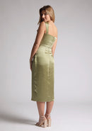 Back quarter image of a model wearing olive satin midaxi dress with  a sweetheart neckline, wide comfy straps and front skirt split. The dress featured is the Vesper Desiree Olive Satin Midaxi Dress