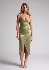 Front image of a model wearing olive satin midaxi dress with  a sweetheart neckline, wide comfy straps and front skirt split. The dress featured is the Vesper Desiree Olive Satin Midaxi Dress