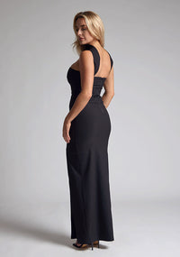 Bac Qaurter image of blonde model wearing a Black Collar Detail Maxi Dress with a  straight neckline and collar detailing at the neck, with straps at the back and a front skirt split, design features Vesper Dune Black Collar Detail Maxi 