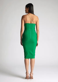 Back image of the model wearing an emerald one shoulder midi dress with a asymmetrical neckline with one strap, bodycon silhouette and discreet back zip for seamless fit. The design featured is the Vesper Leslie Emerald One Shoulder Midi Dress