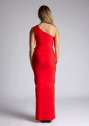 Back image of the model wearing an red maxi dress with a sleeveless stunner boasts an asymmetric design and a flattering wrap belt and front skirt split. The design featured is the Vesper Lisbeth Red Maxi Dress