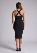 Back image of a blonde model wearing a black sweetheart plunge midi dress with a plunge neckline with cross back detail and a slim fit. The design featured is the Vesper Sian Black Sweetheart Plunge Midi Dress