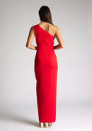 Back image of model wearing red asymmetric maxi dress with a asymmetric neckline with one shoulder detail, front bodice cut-out and front skirt split. The design featured is Vesper Verity Red Asymmetric Maxi Dress