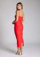 Back quarter image of the model wearing a red midaxi dress with a sweetheart neckline that accentuates your neckline beautifully, bodycon fit and centre gold back zip. The design featured is the Vesper Zoya Red Midaxi Dress
